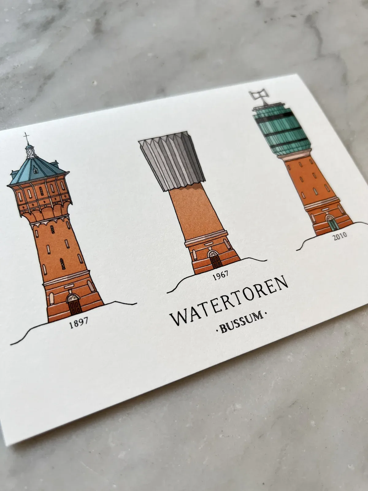 Kaart met drie watertorens van Bussum