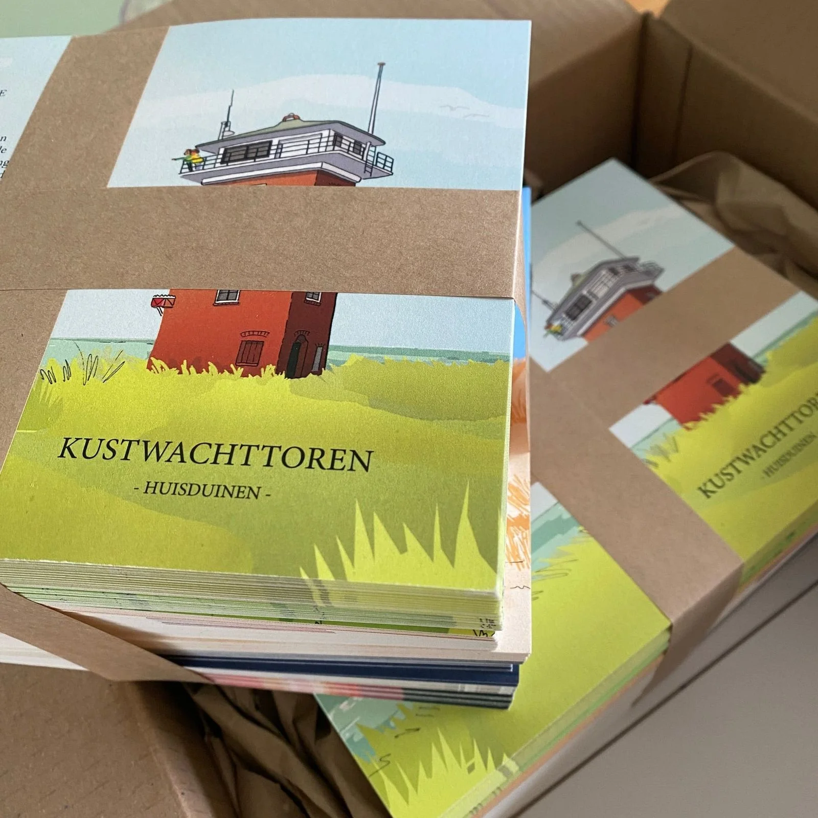 Kaarten met de Kustwachttoren van Huisduinen in een kraftdoos