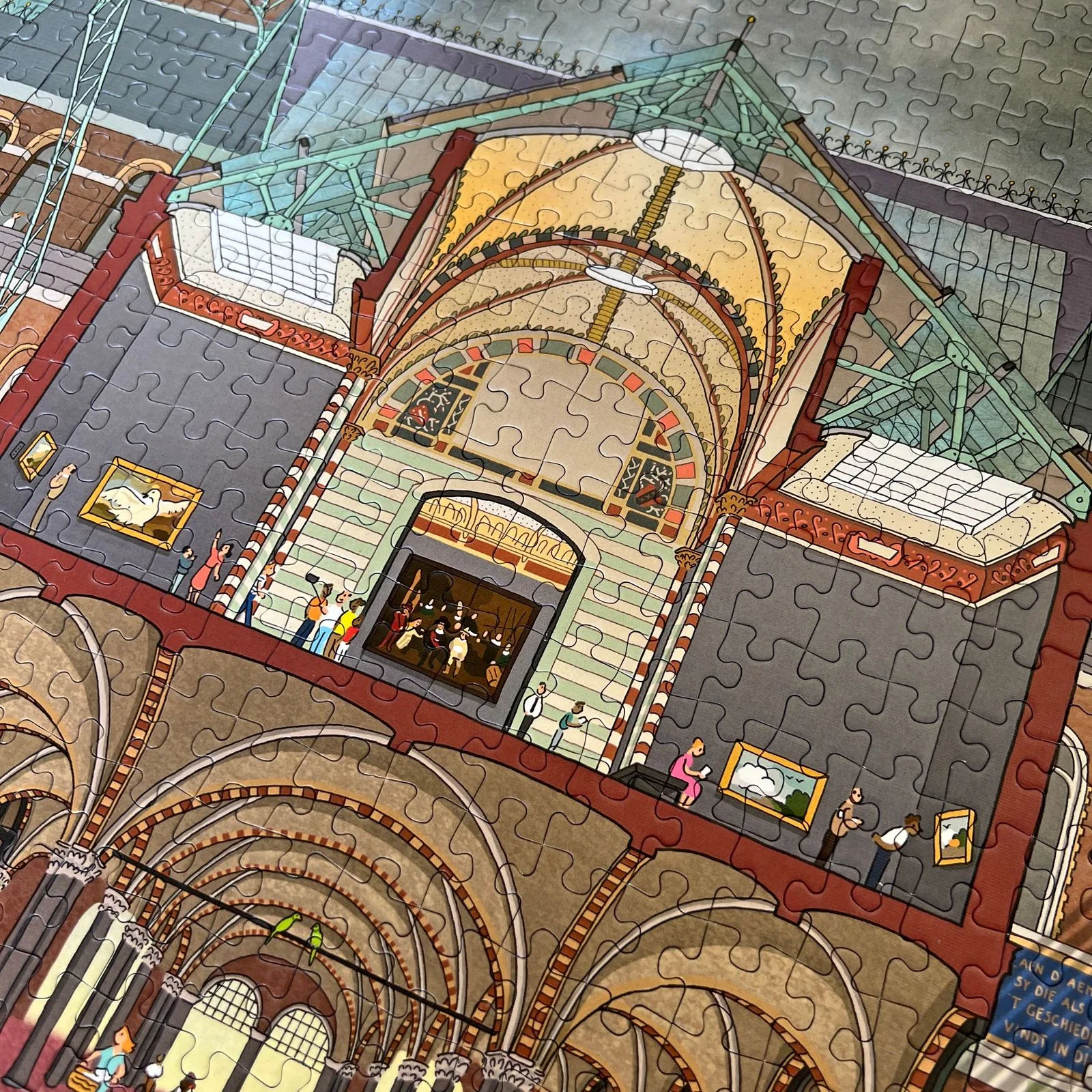 Detail van de gelegde puzzel: de hal van het Rijksmuseum